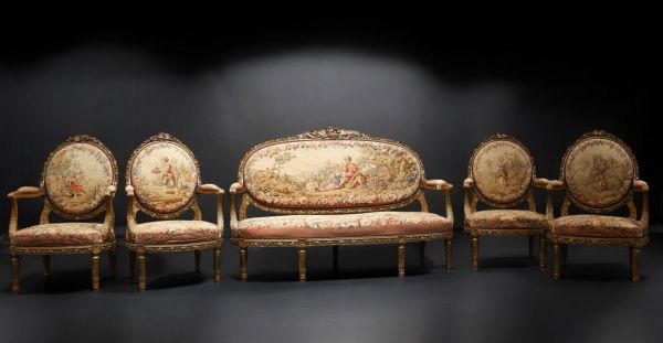 Important ensemble de mobilier de salon en bois sculpté et doré, tapisserie fine d'Aubusson comprenant un canapé et une suite de quatre fauteuils bergères, XIXème.