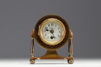 Small Art Nouveau Jugendstil desk clock in brass and rosewood veneer, Germany circa 1900-20.