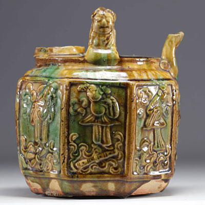 Asia - Glazed stoneware teapot with figures, 19th century.