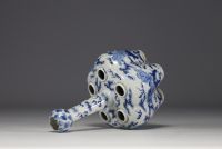 China - White-blue porcelain crocus vase decorated with Fô dogs, Kangxi mark under the piece.