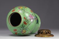 China - A Famille Rose porcelain vase decorated with children, late 18th century/ early 19th century.