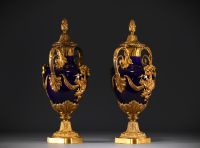 Pair of Louis XVI style covered vases in 