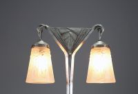 Muller Frères Lunéville - Art Deco double lamp in hammered metal and pair of stylized globes, signed.