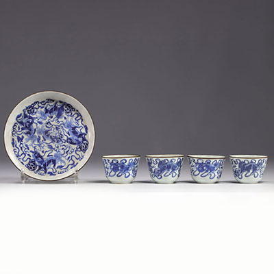 Tea service with tray and 4 bowls in white and blue porcelain decorated with dogs