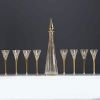 Elegant carafe in cut glass enhanced with gold and eight glasses.