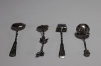 Asia - Set of four silver spoons decorated with bamboo and flowers.