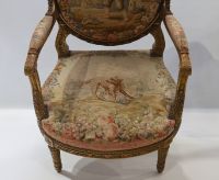 Important ensemble de mobilier de salon en bois sculpté et doré, tapisserie fine d'Aubusson comprenant un canapé et une suite de quatre fauteuils bergères, XIXème.