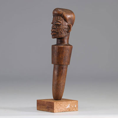 Stopper decorated with a carved Makonde head from Mozambique