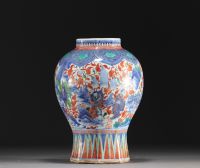 China - Polychrome porcelain vase decorated with figures and landscape, transition period.