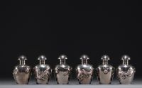 China - Set of twelve solid silver salt cellars with dragon decoration, early 20th century.