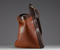 Delvaux - Sac à main bandoulière en cuir cognac et brun plus housse de protection.