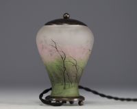 DAUM Nancy - Enamelled glass night-light decorated with a forest in the rain and wind, metal structure, signed in the decoration.