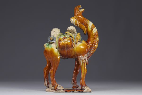 China - Tang-style glazed stoneware camel, unidentified period.