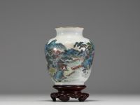 China - Polychrome porcelain vase with landscape decoration, wooden base, blue mark under the piece.