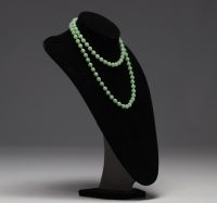 China - green jade pearl necklace with solid silver clasp.