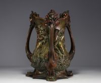 Raphaël Charles PEYRE (1872-1949) Imposing Art Nouveau bronze jardinière decorated with women in bloom, signed.