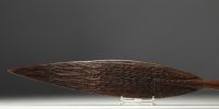 New Guinea, Sepik, Ceremonial paddle in carved wood with traces of polychromy.