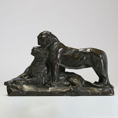 L. BOUCHÉ (19th-20th century) Couple of panthers - Glazed terracotta, signed.