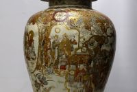 Japan - Imposing Satsuma covered vase decorated with dignitaries, magicians and courtesans, Meiji period.