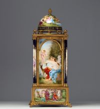 VIENNA - Imposing architectural clock in the form of a temple surmounted by a dome, polychrome porcelain with antique-style figures, bronze mounting.