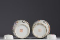 China - Pair of covered pots in polychrome porcelain decorated with figures, mark under the piece.