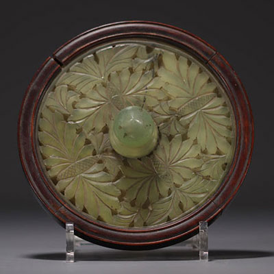 China - Carved jade hand mirror.