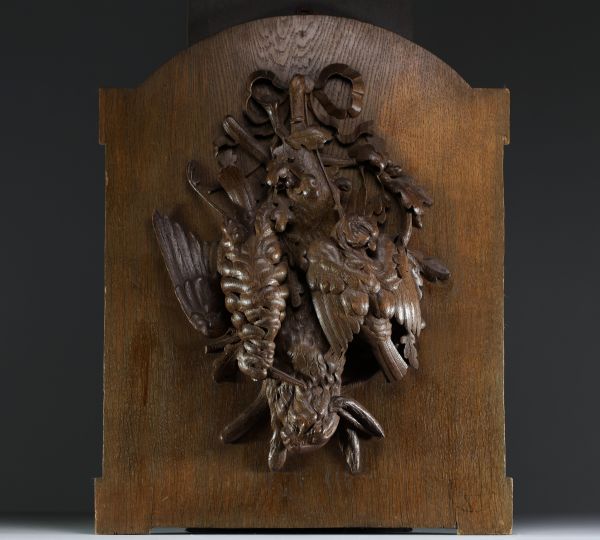 ‘Hare, partridge and woodcock hunting trophy’. Low relief in carved wood, Black Forest, 19th century.