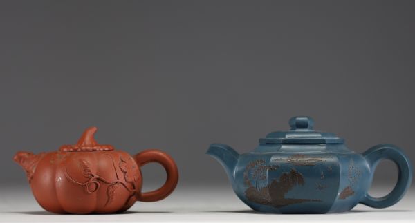 China - Set of two Yixing clay teapots.