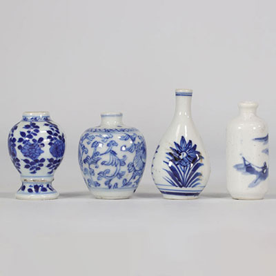 (4) Set of four blue and white miniature vases with various designs from the 18th- 19th centuries