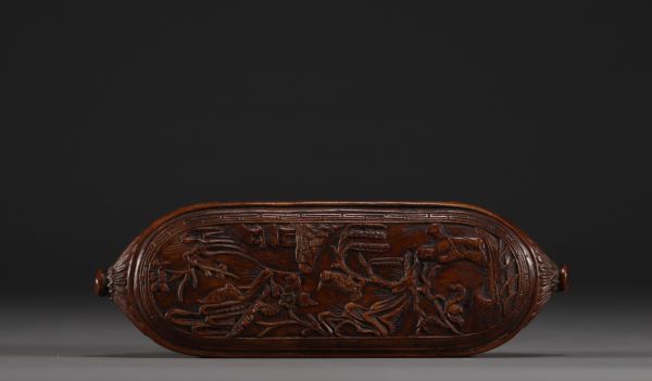 China - Carved wooden spectacle case decorated with characters and a village.