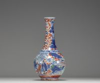China - A polychrome porcelain vase decorated with characters, 17th century.