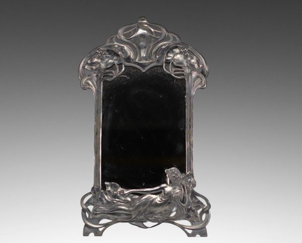 WMF - Art Nouveau mirror with woman flower design.