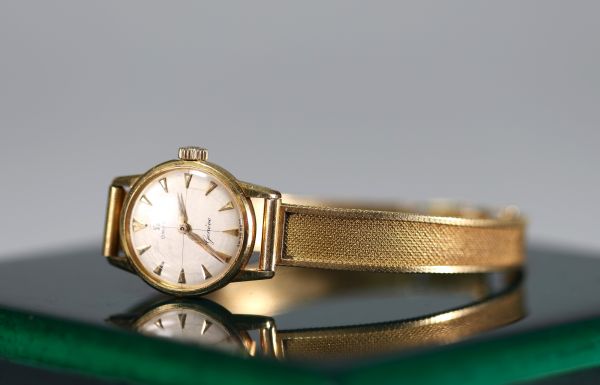 OMEGA - 18k yellow gold ‘complete gold’ mechanical ladies' watch, circa 1950-60, total weight 30gr.