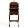 Gervais Maximilien DURAND (1839-1911) in the style of - A small Louis XV style mahogany and gilt bronze shelving unit, 19th century.formant étagère en acajou et bronze doré de style Louis XV, XIXème.