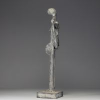 ‘Maternity’ African woman carrying her child - Constructivist sculpture in zinc.