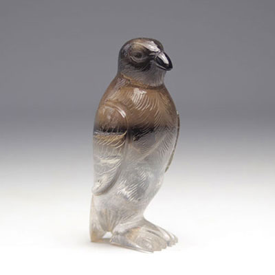 Penguin carved in rock crystal