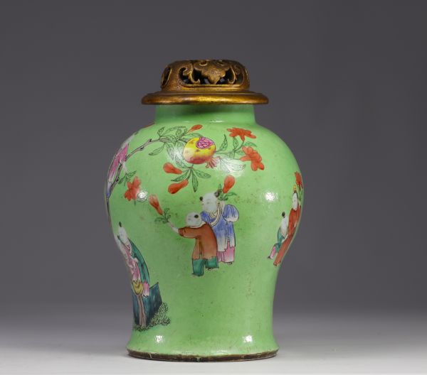 China - A Famille Rose porcelain vase decorated with children, late 18th century/ early 19th century.