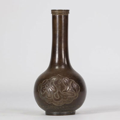 Bronze vase decorated with oriental symbols from the 18th century