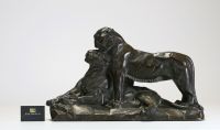 L. BOUCHÉ (19th-20th century) Couple of panthers - Glazed terracotta, signed.