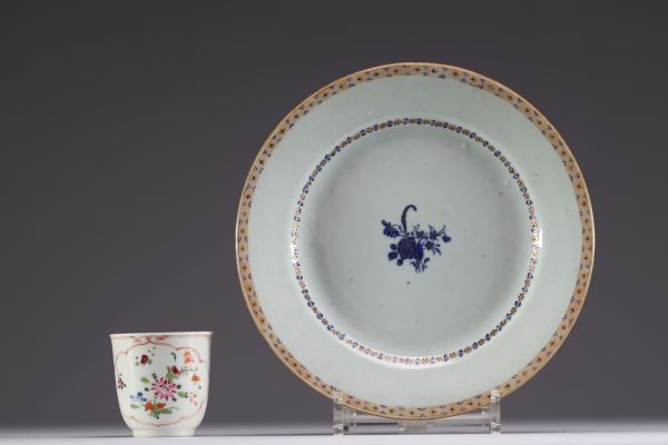 China - Set of two Compagnie des Indes polychrome porcelain pieces comprising a plate and a cup, 18th century.