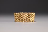 Large flexible bracelet in 18K yellow gold, weighing 62.1gr.