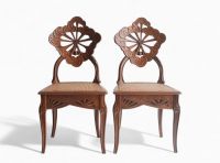 Émile GALLÉ (1846 - 1904) ‘Ombelles’ model Exceptional pair of solid walnut chairs, circa 1903-1904