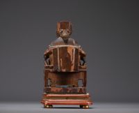 China - Statuette of a Dignitary in carved wood, Ming period.