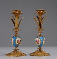 Pair of porcelain and gilt bronze candlesticks