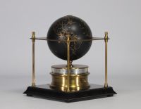 The Royal Geographical Society World Clock - Arthur IMHOF Black lacquered metal and gilt metal globe clock with brass identification plate