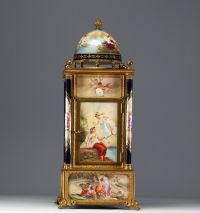 VIENNA - Imposing architectural clock in the form of a temple surmounted by a dome, polychrome porcelain with antique-style figures, bronze mounting.