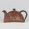 China - Yixing clay scholar's teapot, bronze handle, lid and spout, Qing Dynasty.