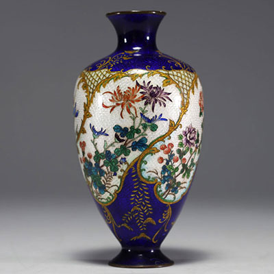 Japan - Blue cloisonné enamel vase with floral design on a white background.