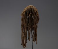 Africa - Dan mask in carved wood, braided ropes and bells, early 20th century