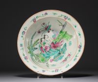 China - Pair of Famille Rose porcelain dishes decorated with figures, flowers and bats.